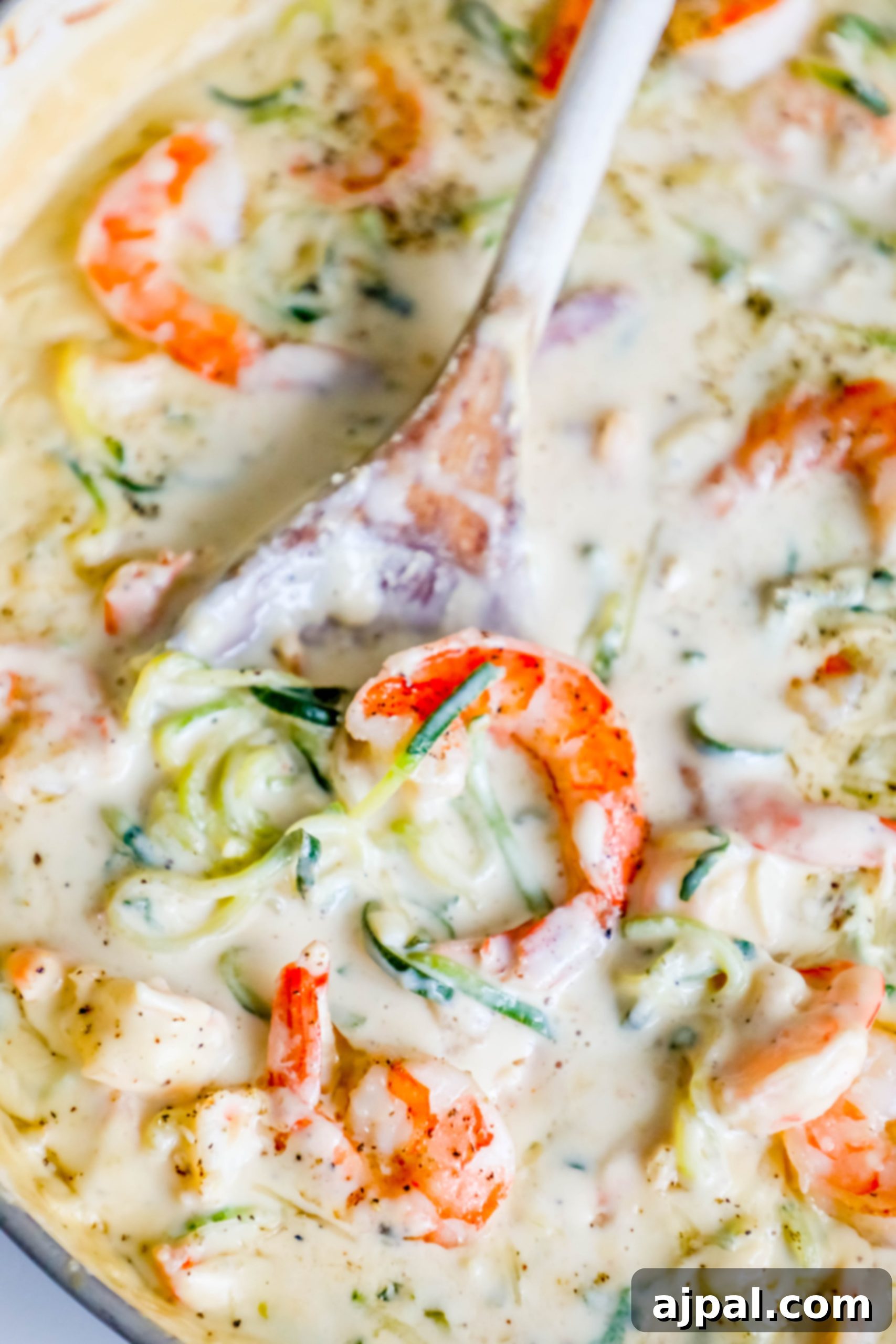 Velvet Shrimp Zoodle Alfredo 6 shrimp in a creamy sauce with noodles made out of zucchini