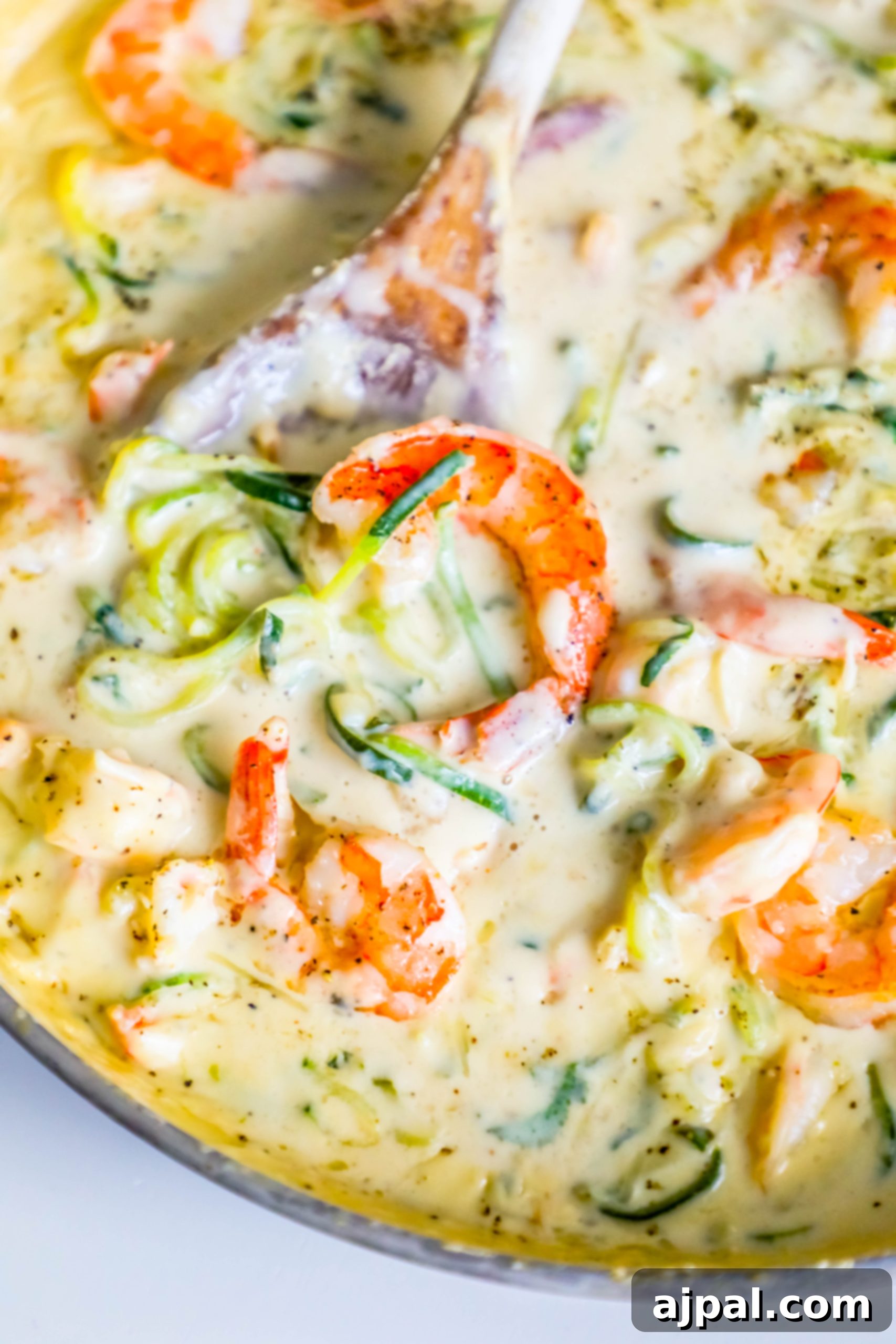 Velvet Shrimp Zoodle Alfredo 5 shrimp in a creamy sauce with noodles made out of zucchini