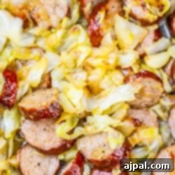 Saint Particks Day Cabbage Recipe: Delicious slow cooker dish with sausage and cabbage.