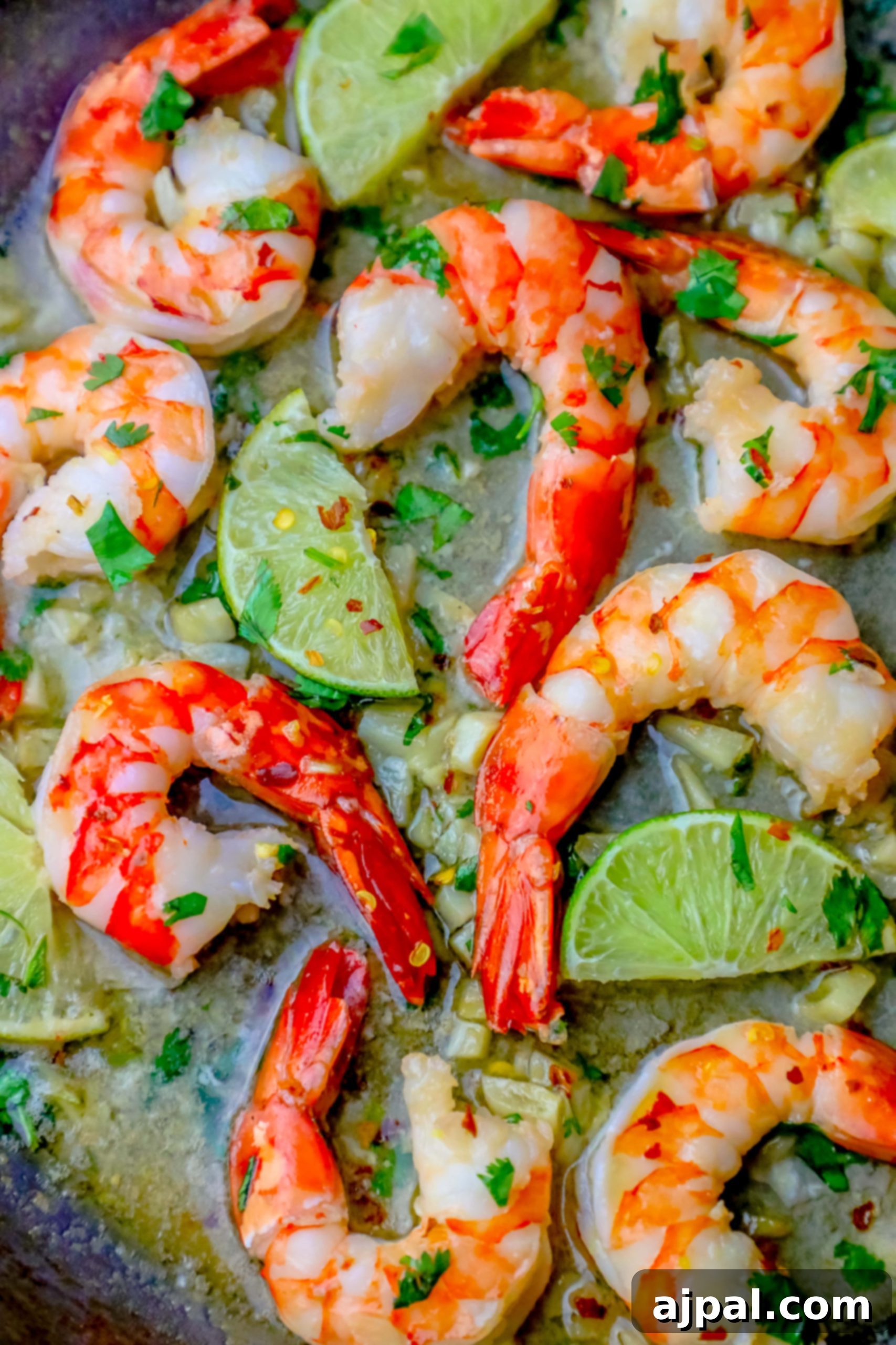 Effortless Cilantro Lime Shrimp 4 shrimp, limes, and cilantro in a pan