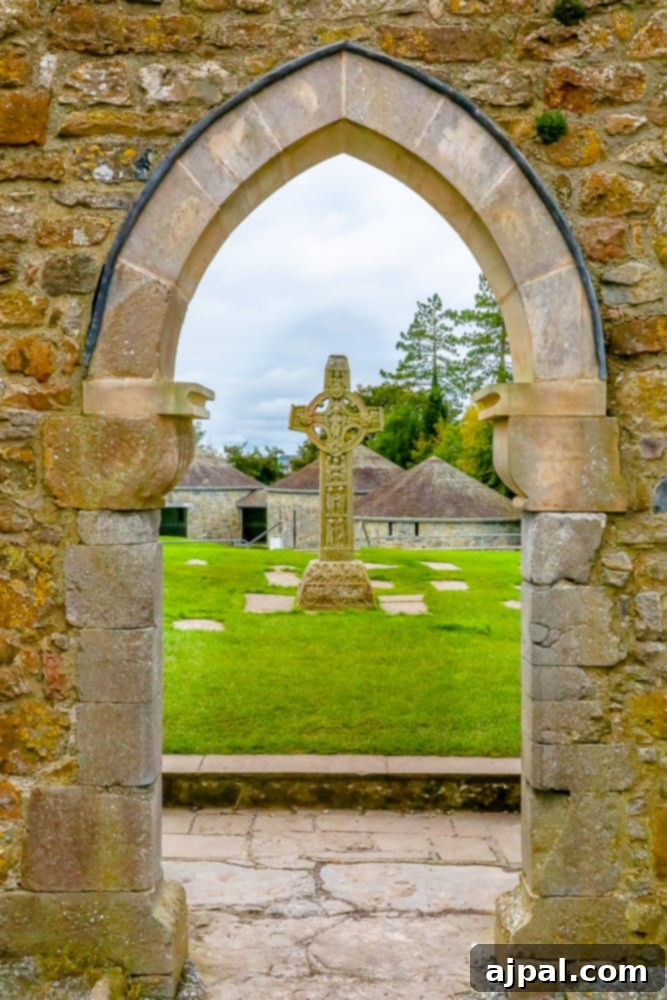 A stone archway guiding visitors to a tranquil grassy spot in the heart of Athlone, Ireland’s Midlands.