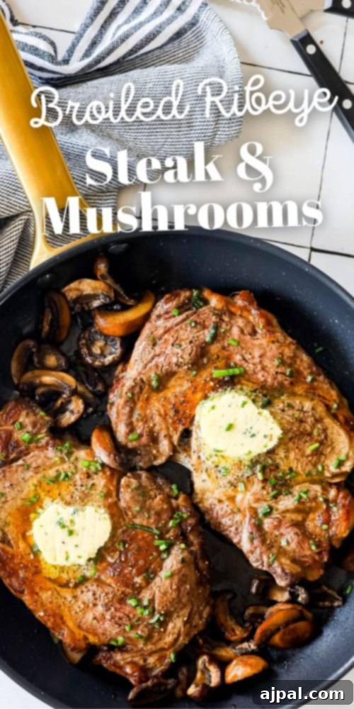 A close-up vertical shot of a perfectly broiled ribeye steak with mushrooms, highlighted by a rich, melted butter, ready to be carved.