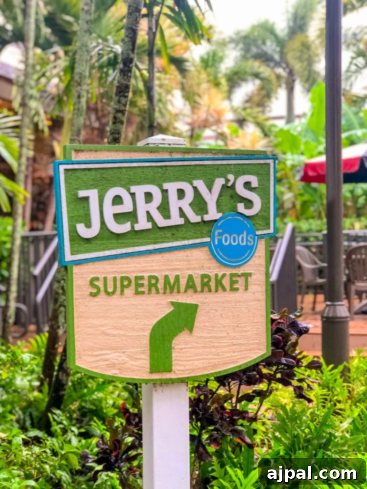Savor Sanibel: A Culinary Journey 28 Jerry's supermarket sign in front of a tropical garden, offering the best dessert selection in Sanibel, Florida.