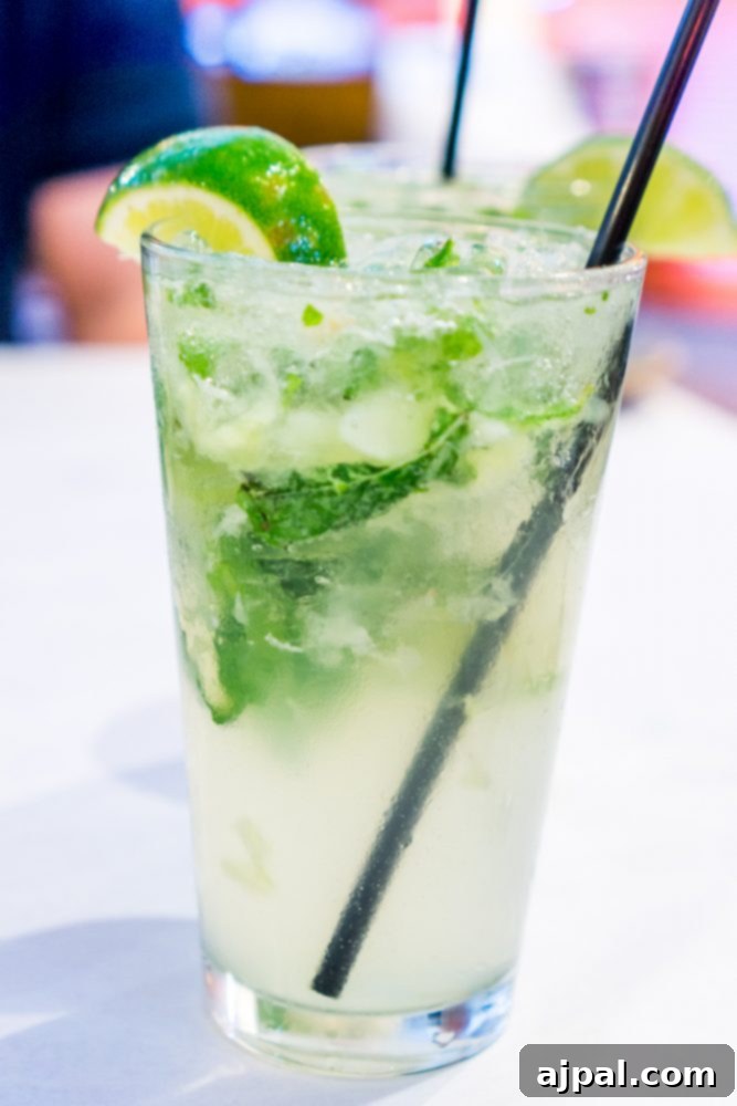 Savor Sanibel: A Culinary Journey 29 Two glasses of mojito on a table, perfect for dinner on Sanibel Island.