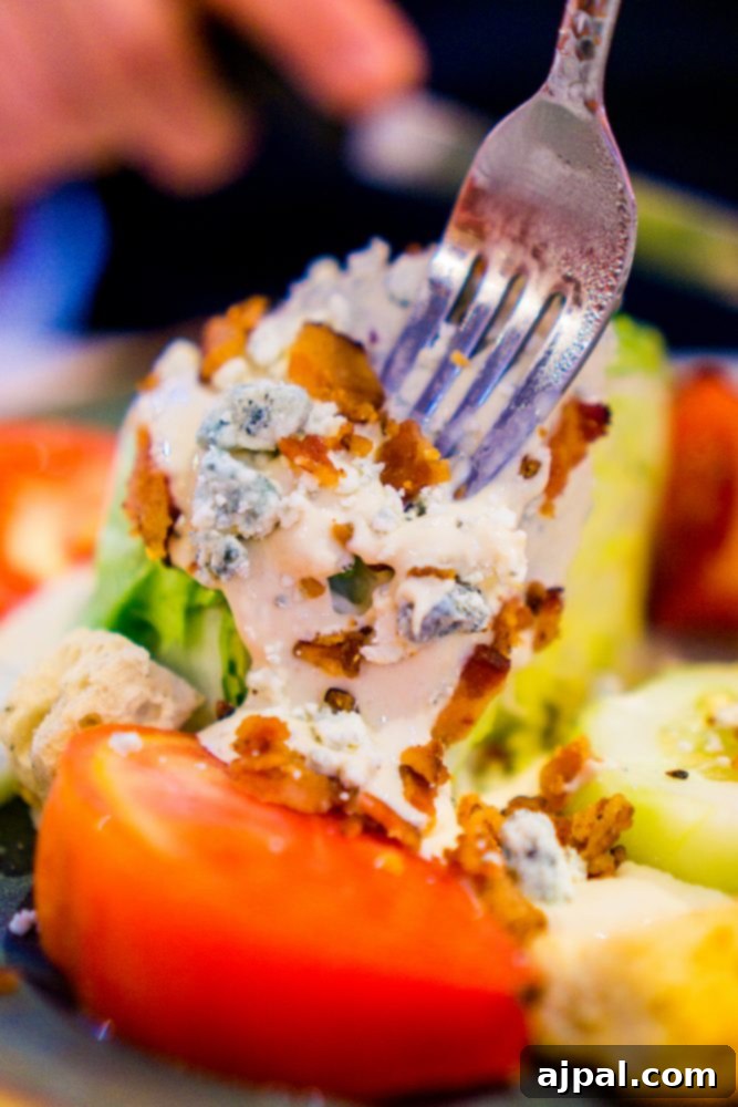 Savor Sanibel: A Culinary Journey 31 A person is holding a fork to a plate of food with the best dessert in Sanibel.
