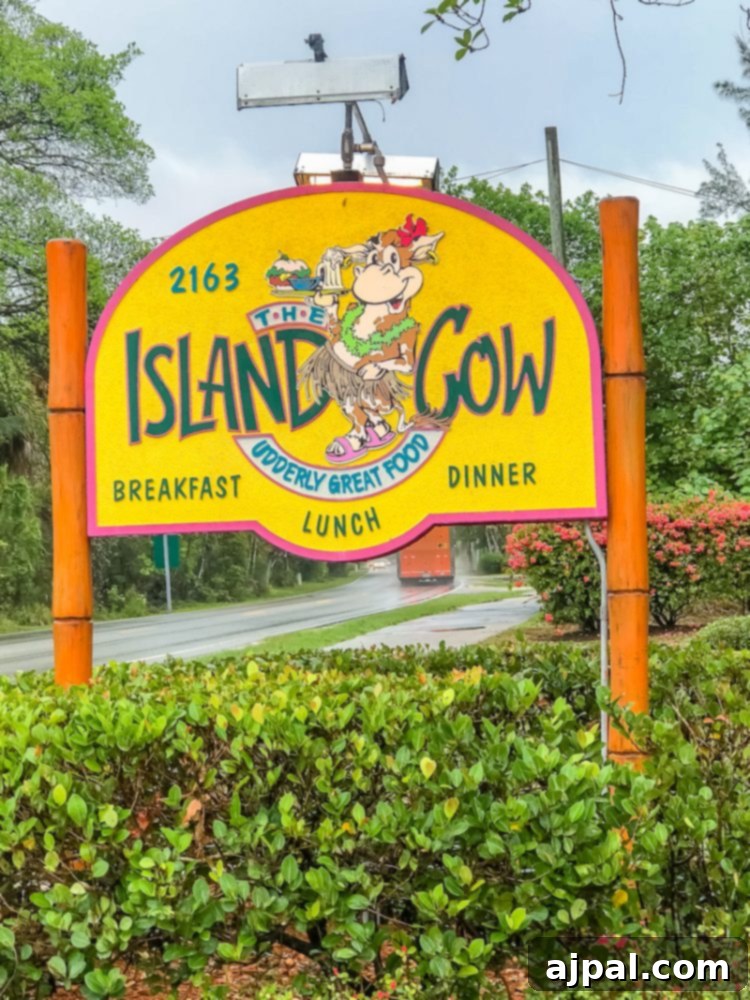 Savor Sanibel: A Culinary Journey 10 A sign for Island Cow breakfast diner in Tampa featuring the best desserts on Sanibel Island, Florida.