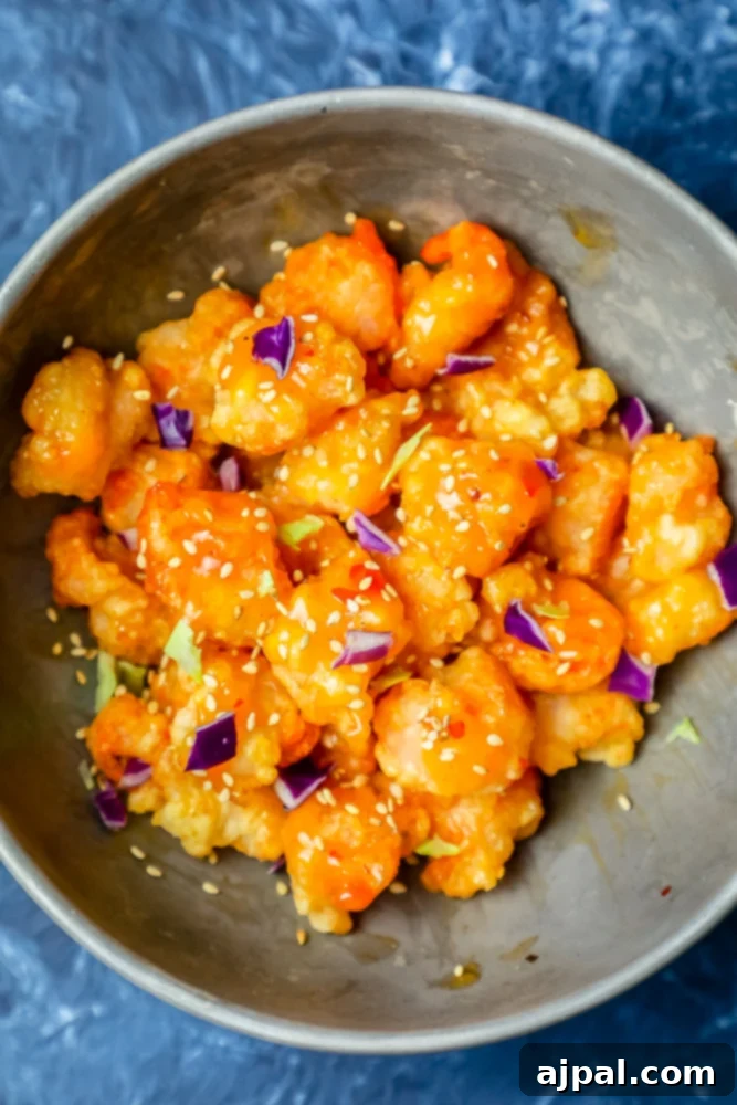 picture of bang bang fried shrimp with sesame seeds in a bowl
