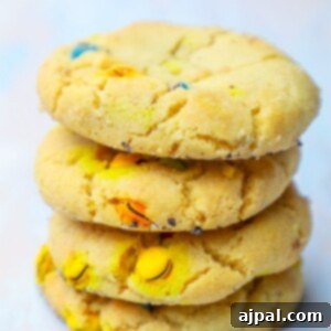 A stack of colorful sprinkle cookies.