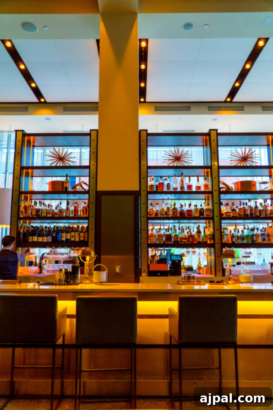 A restaurant featuring a bar, offering diverse food options beyond BBQ, in Kansas City.