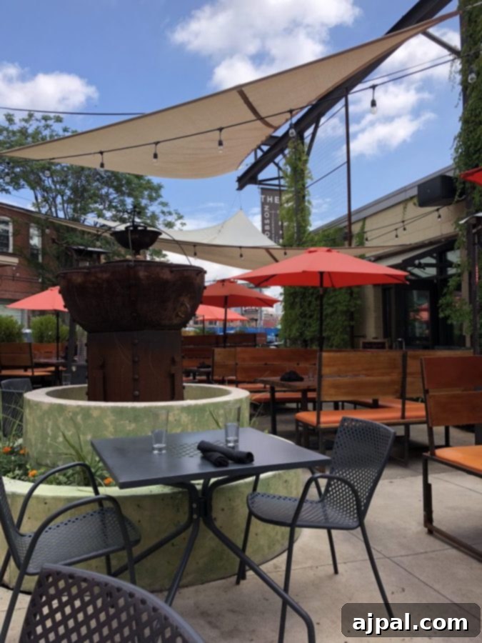 An outdoor patio with tables and chairs, perfect for enjoying the best restaurants and food in Kansas City.