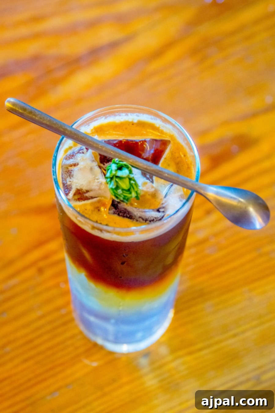 Discover Kansas City: 10 Unforgettable Experiences 19 Craft coffee with a spoon in a rustic setting at Thou Mayest, Kansas City