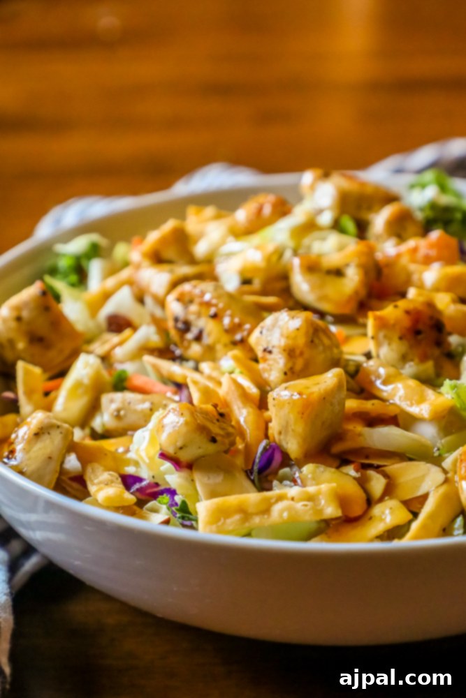 Beautifully presented Chinese chopped chicken salad, rich with color and texture.