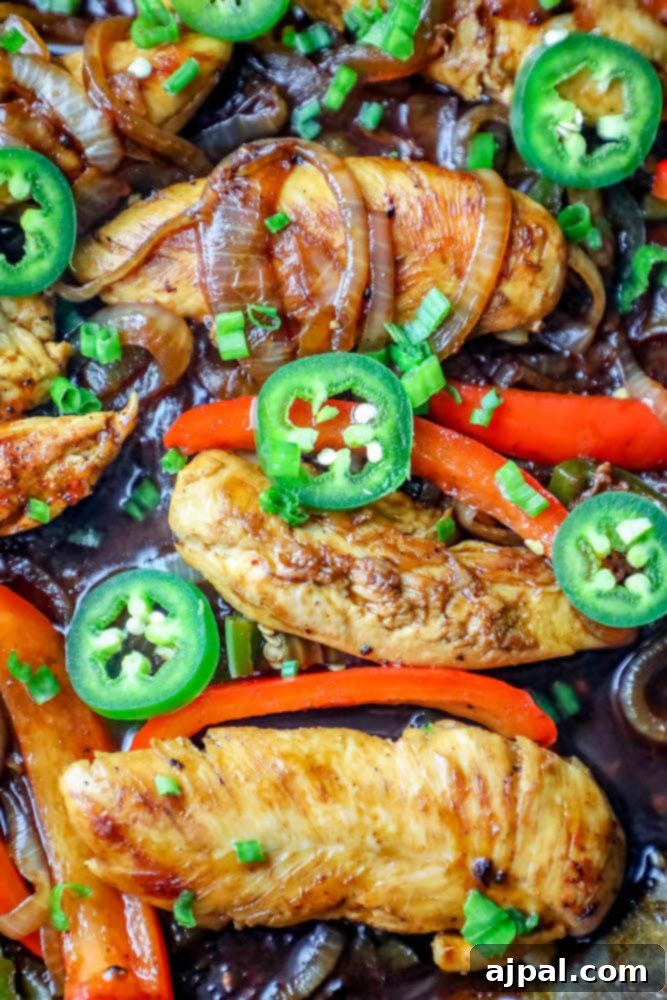 chicken, onions, peppers, and jalapenos in a pot together