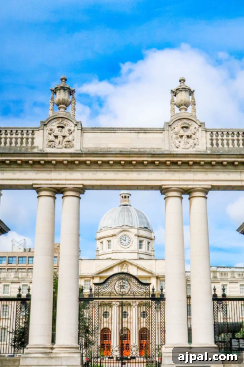 Elegant building entrance with columns under a blue sky in Dublin, Ireland
