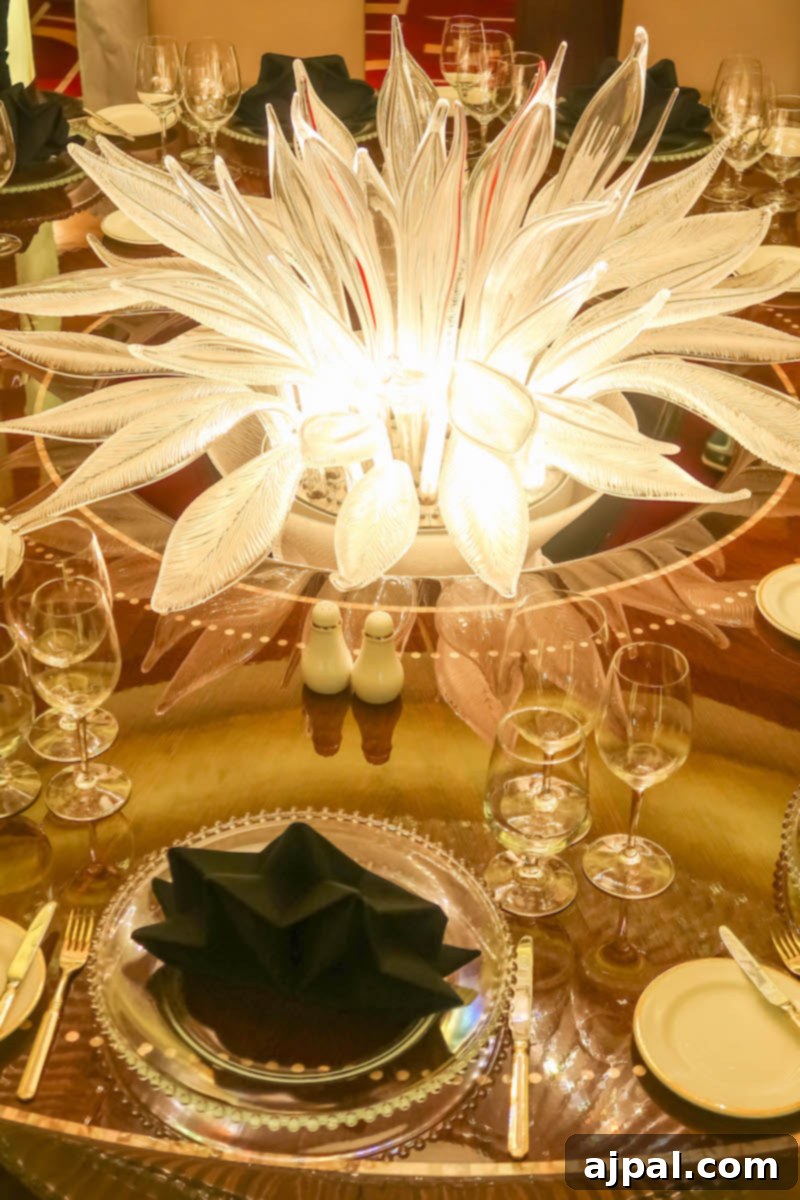 West Coast Majesty: A Royal Princess Voyage 11 A round table adorned with a flower, found on the Cruising Royal Princess ship.