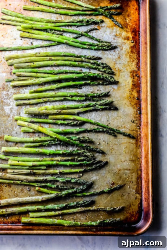 Crispy Roasted Asparagus 4 Freshly roasted asparagus spears garnished with lemon slices