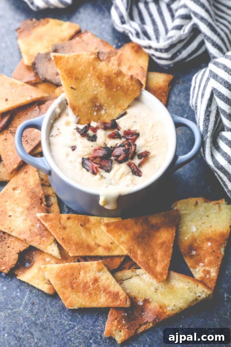 Quick Keto Tortilla Crisps 8 Picture of keto tortilla chips on a plate with dip, ready for a party.