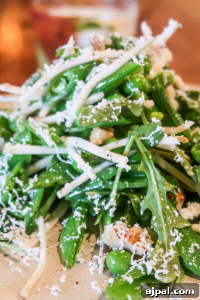 Idyllic Santa Ynez Valley Getaway 13 A vibrant fresh pea salad with greens and nuts, a standout dish at S.Y. Kitchen, offering a taste of Santa Ynez Valley's culinary excellence.