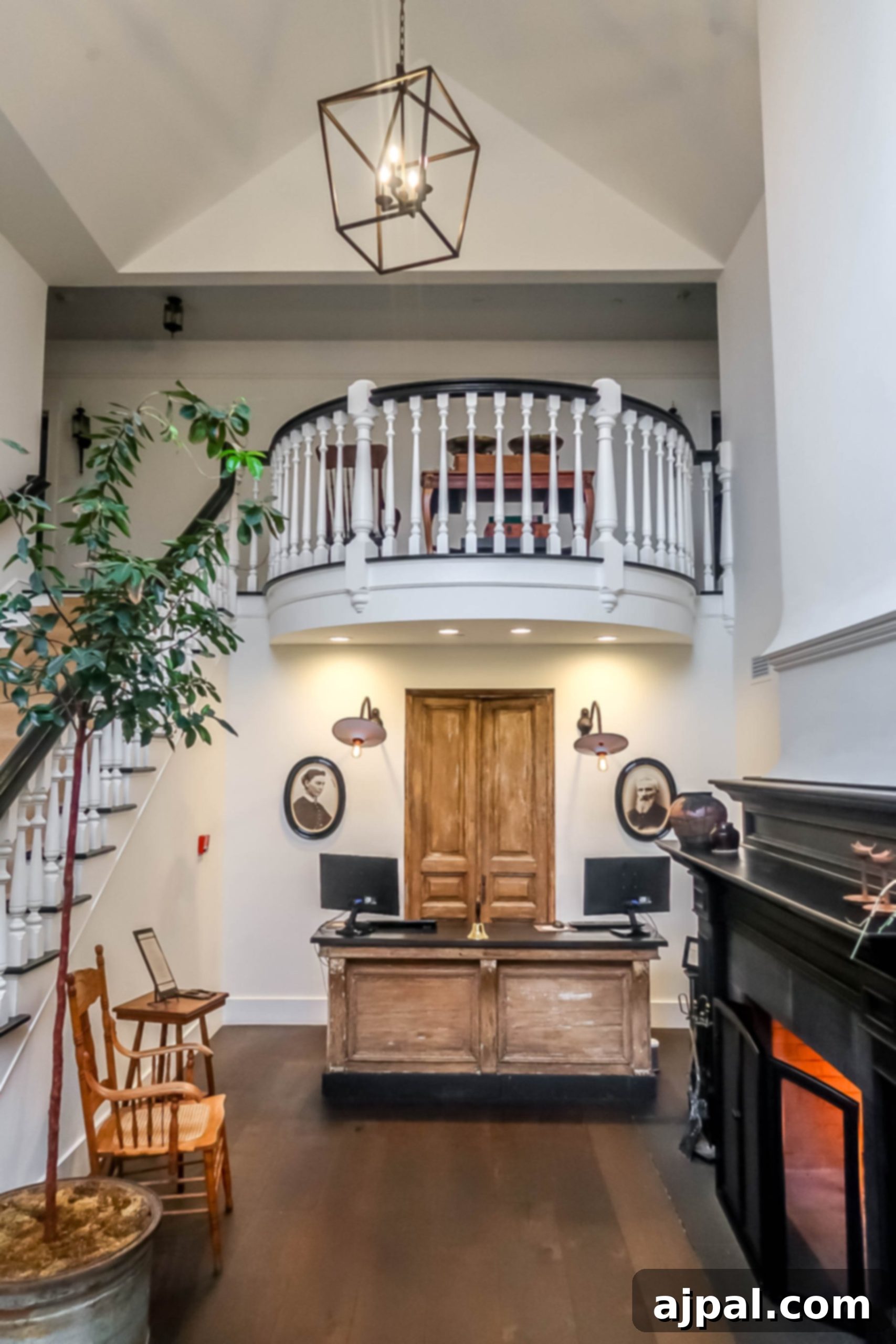 Idyllic Santa Ynez Valley Getaway 5 The elegant lobby of the Ballard Inn, featuring a grand staircase and a welcoming fireplace, ideal for a relaxing stay in the Santa Ynez Valley.