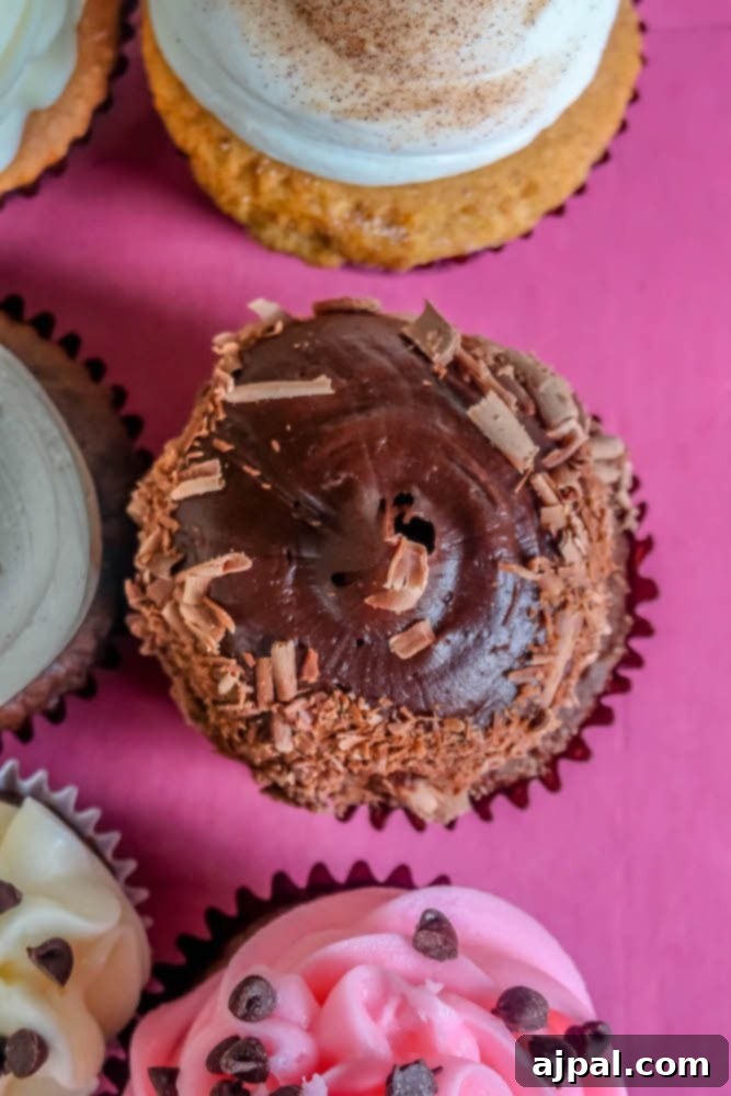 A group of cupcakes on a pink background in Oxnard, California.