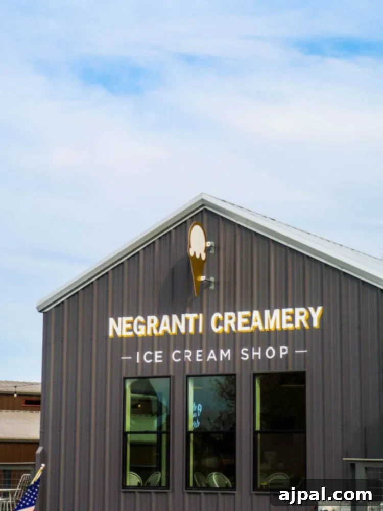 A building with a sign that says negarti creamery ice cream shop, located in Paso Robles and Atascatero, offering a variety of activities and accommodations.