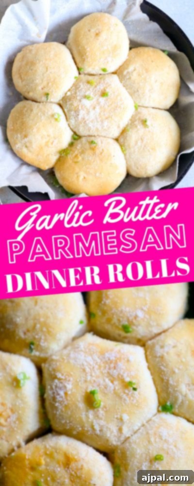 A tantalizing stack of garlic butter parmesan dinner rolls, showcasing their golden crust and fluffy interior, ready for serving.