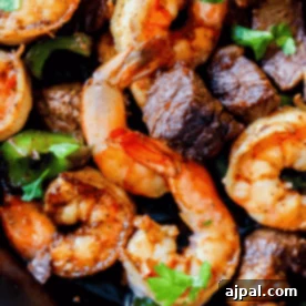 A plate of Cajun steak and shrimp.