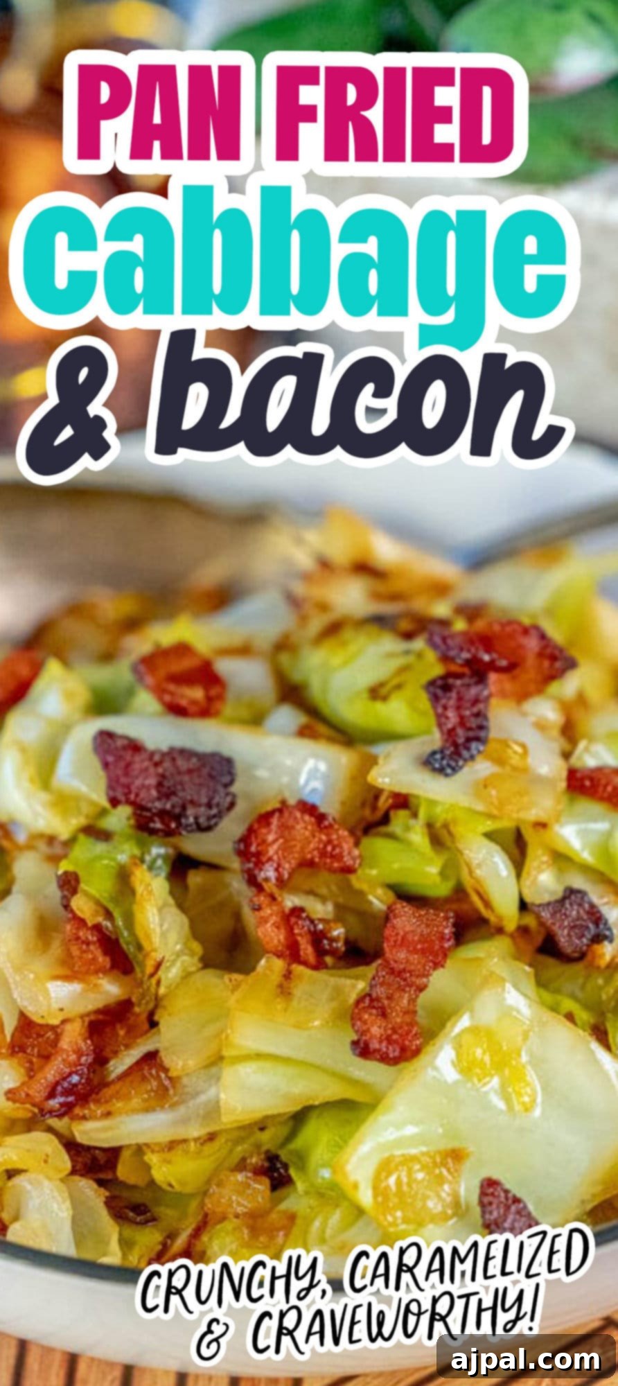 Browned cabbage with crunchy bacon and onions in a white bowl.