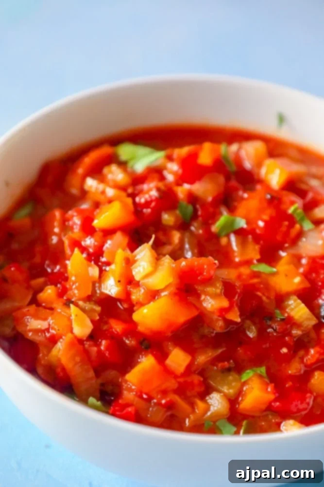 Easy Homemade Creole Sauce 6 A vibrant and savory Easy One-Pot Creole Sauce served in a rustic bowl, showcasing its rich texture and colors.