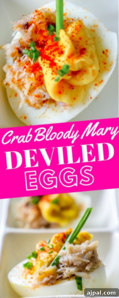 Spicy Crab Bloody Mary Deviled Eggs 6 A close-up of a Crab Keto Bloody Mary Deviled Egg, showcasing the rich filling, crab meat, and a light garnish, elegantly presented.