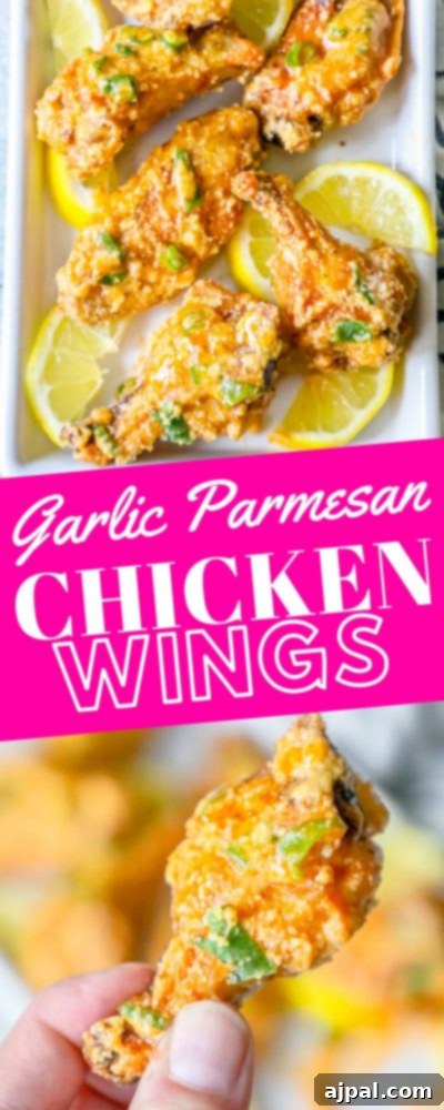 A close-up of garlic parmesan chicken wings arranged on a plate.