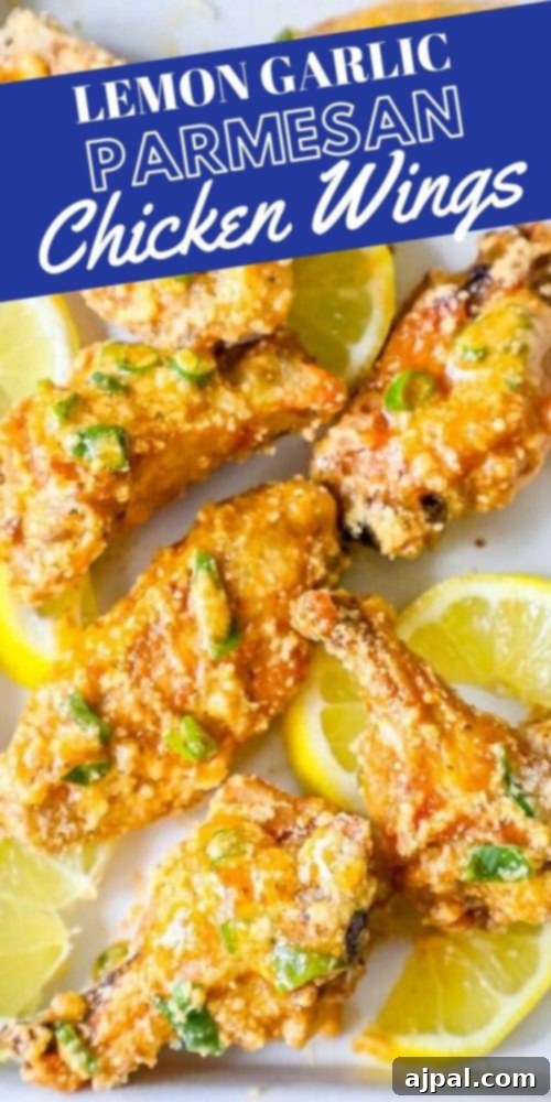 Close-up of lemon garlic parmesan chicken wings on a plate, showcasing their crispy texture.