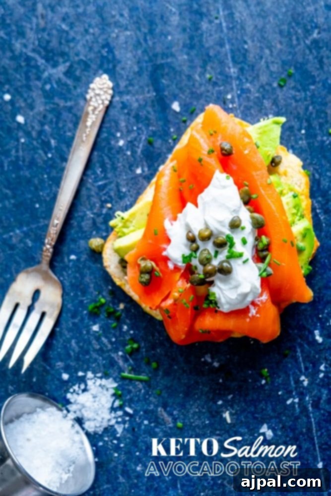 A close-up of a keto-friendly salmon and avocado toast, ready to be enjoyed.