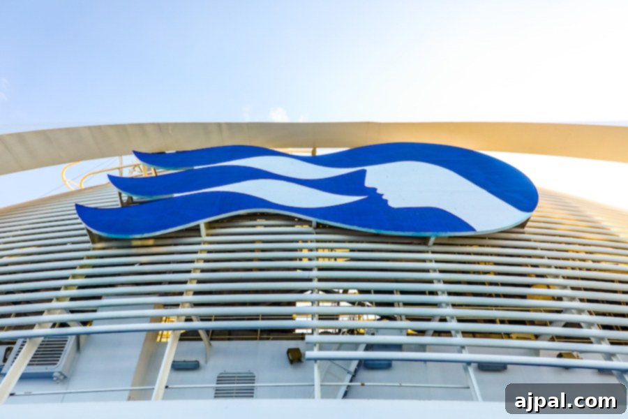 A majestic Princess Cruises ship showcasing the distinctive Ocean Medallion logo, symbolizing innovation and personalized service at sea.