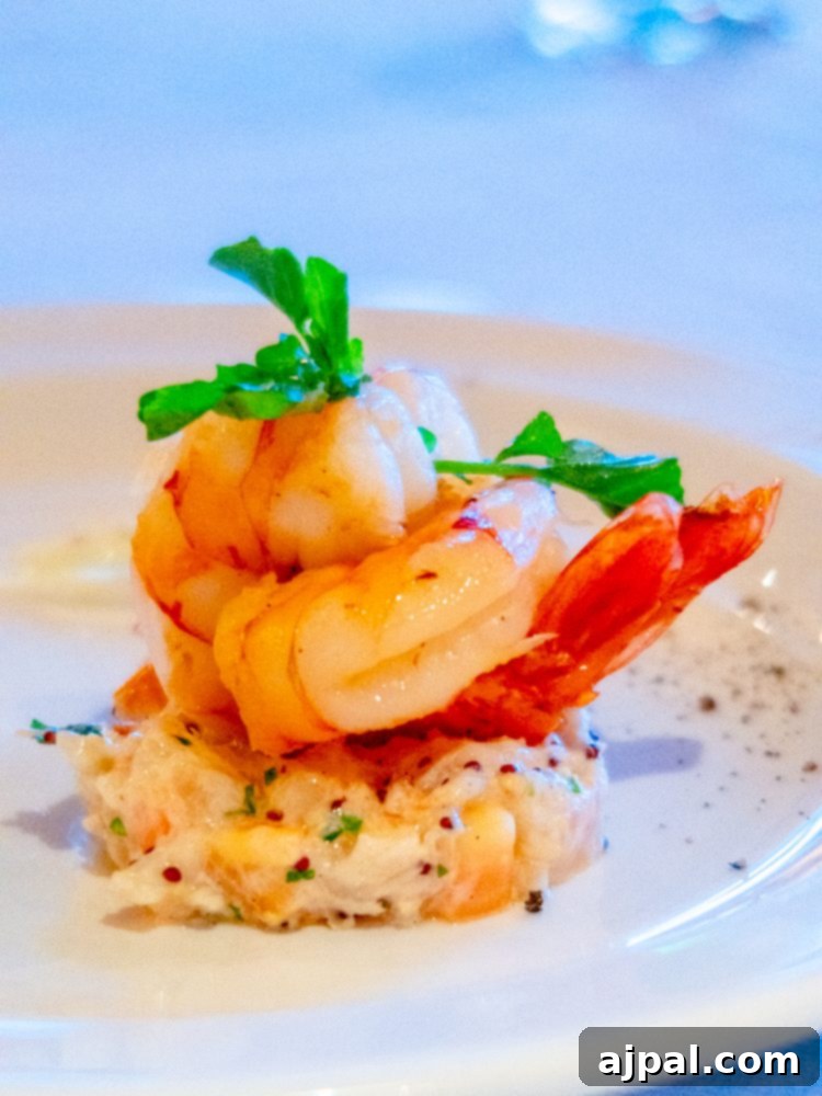 Gluten-Free Cruising on the Caribbean Princess 9 A shrimp dish served on a white plate aboard Princess Cruises with gluten-free dining options.