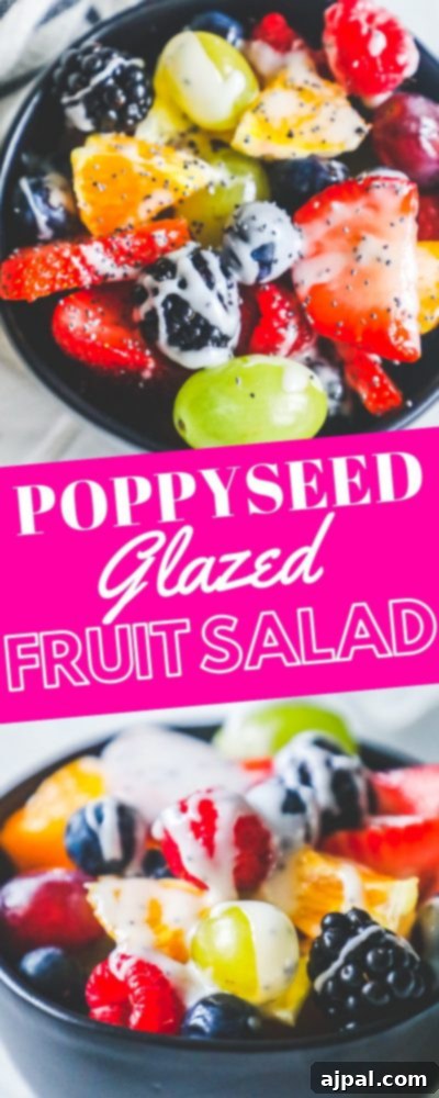 A close-up of a generously glazed lemon poppyseed fruit salad, showcasing its vibrant colors and tantalizing texture.