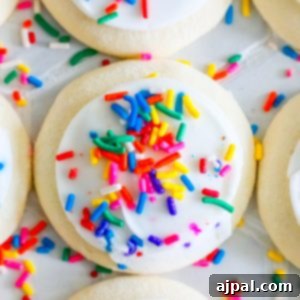 Copycat Lofthouse cookies with sprinkles and icing.