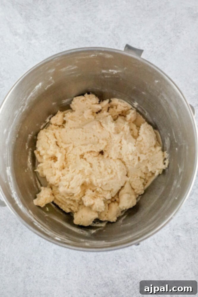 Simple Lofthouse Style Frosted Sugar Cookies 8 picture of creamed butter sugar and egg in a bowl