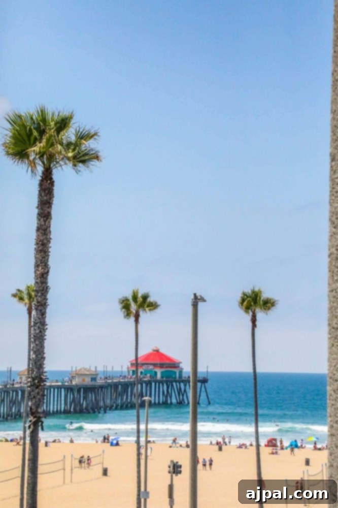 Golden State Wanderlust 6 The iconic Huntington Beach Pier extends into the Pacific Ocean, lined with palm trees, capturing the essence of a California beach road trip.