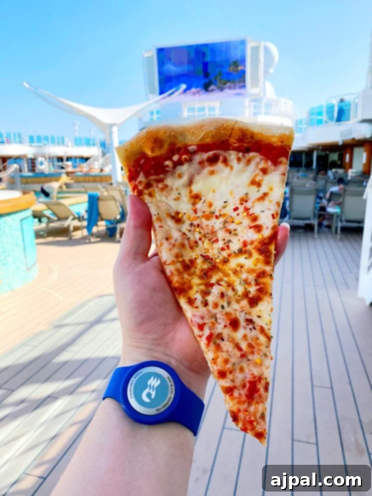 Sky Princess's Stellar Bar Hop 12 A person savoring a delicious slice of pizza on the deck of the Sky Princess cruise ship, a perfect snack during the bar crawl.