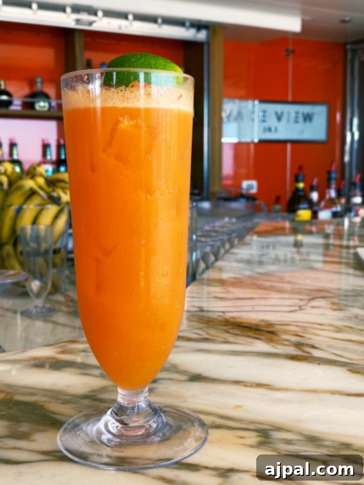 Sky Princess's Stellar Bar Hop 7 A vibrant glass of orange juice, part of the exquisite beverage selection, is enjoyed during the Ultimate Sky Princess Cruise Ship bar crawl.