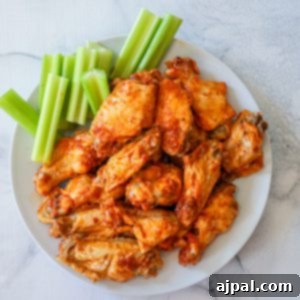 Ultimate Instant Pot Chicken Wings 8 Easy Instant Pot Buffalo Wings with celery sticks.