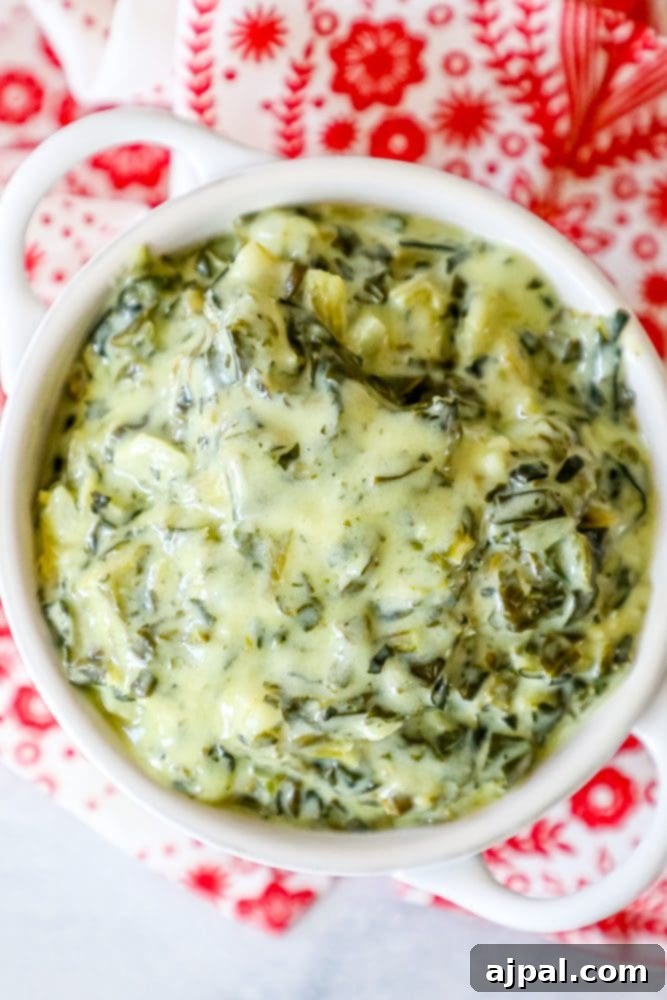 creamed green spinach in a white bowl