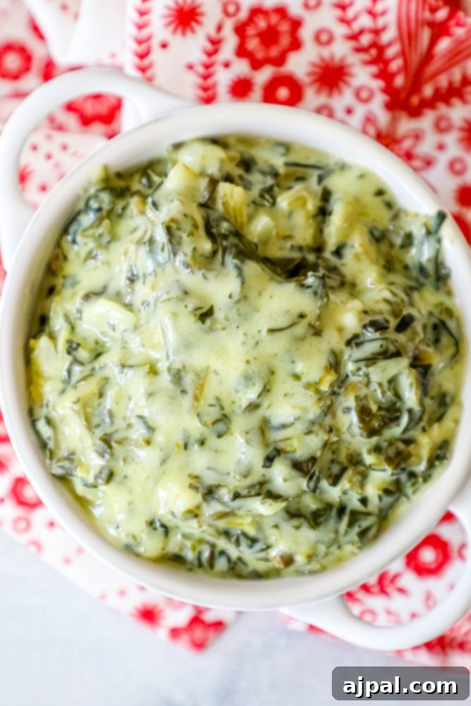 creamed green spinach in a white bowl