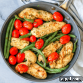 One Pan Tuscan Chicken and Vegetables 10 Easy Italian Chicken and Vegetables Skillet with green beans and tomatoes.