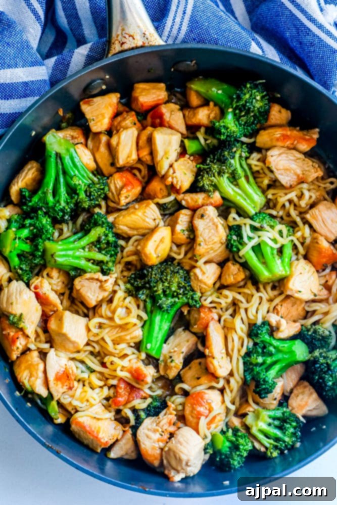 Homemade Teriyaki Chicken Noodles 5 Chicken teriyaki stir-fry with broccoli and noodles in a large skillet, ready for serving