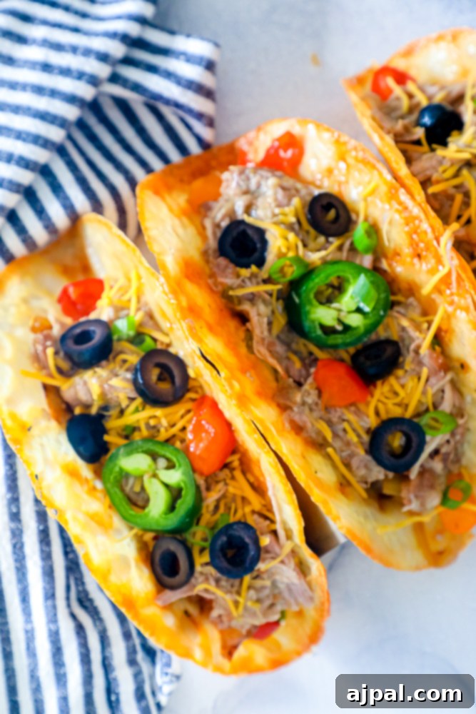 Zesty Green Chile Pork Carnitas 9 Crispy cheese shells generously filled with shredded pork, topped with fresh jalapeños and black olives.