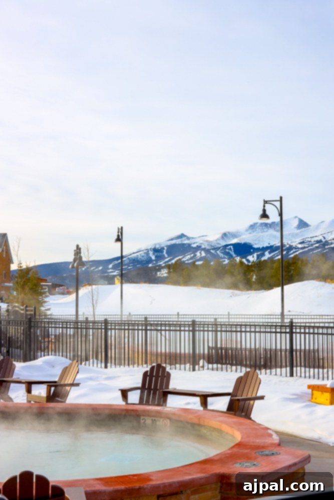 Ranahan By Welk Resorts: Breckenridge Colorado 4 A bubbling hot tub surrounded by fresh snow at The Ranahan By Welk Resorts in Breckenridge, Colorado, offering a warm sanctuary amidst a winter wonderland.