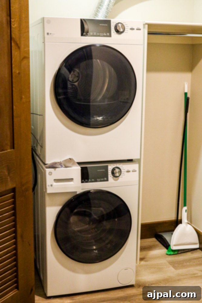 Ranahan By Welk Resorts: Breckenridge Colorado 7 A pristine laundry room at The Ranahan By Welk Resorts in Breckenridge, Colorado, featuring a modern full-sized washer and dryer, emphasizing the resort's home-like amenities.