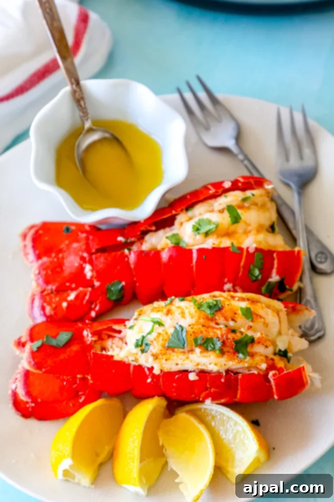 Lobster tails served on a white plate with lemon wedges, prepared using an Instant Pot for an easy and delicious meal.